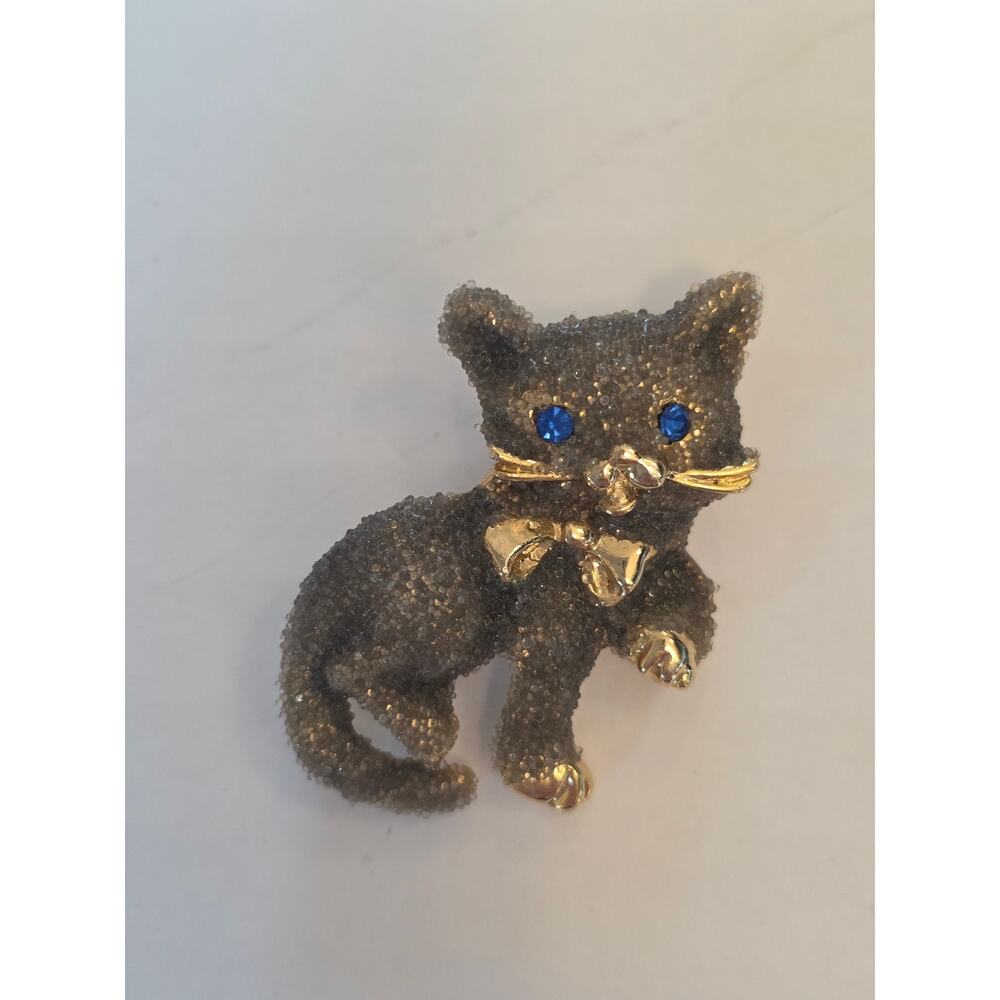 Kitty Cat with Blue Rhinestone Eyes Brooch Gold Tone Encrusted Playful Bow